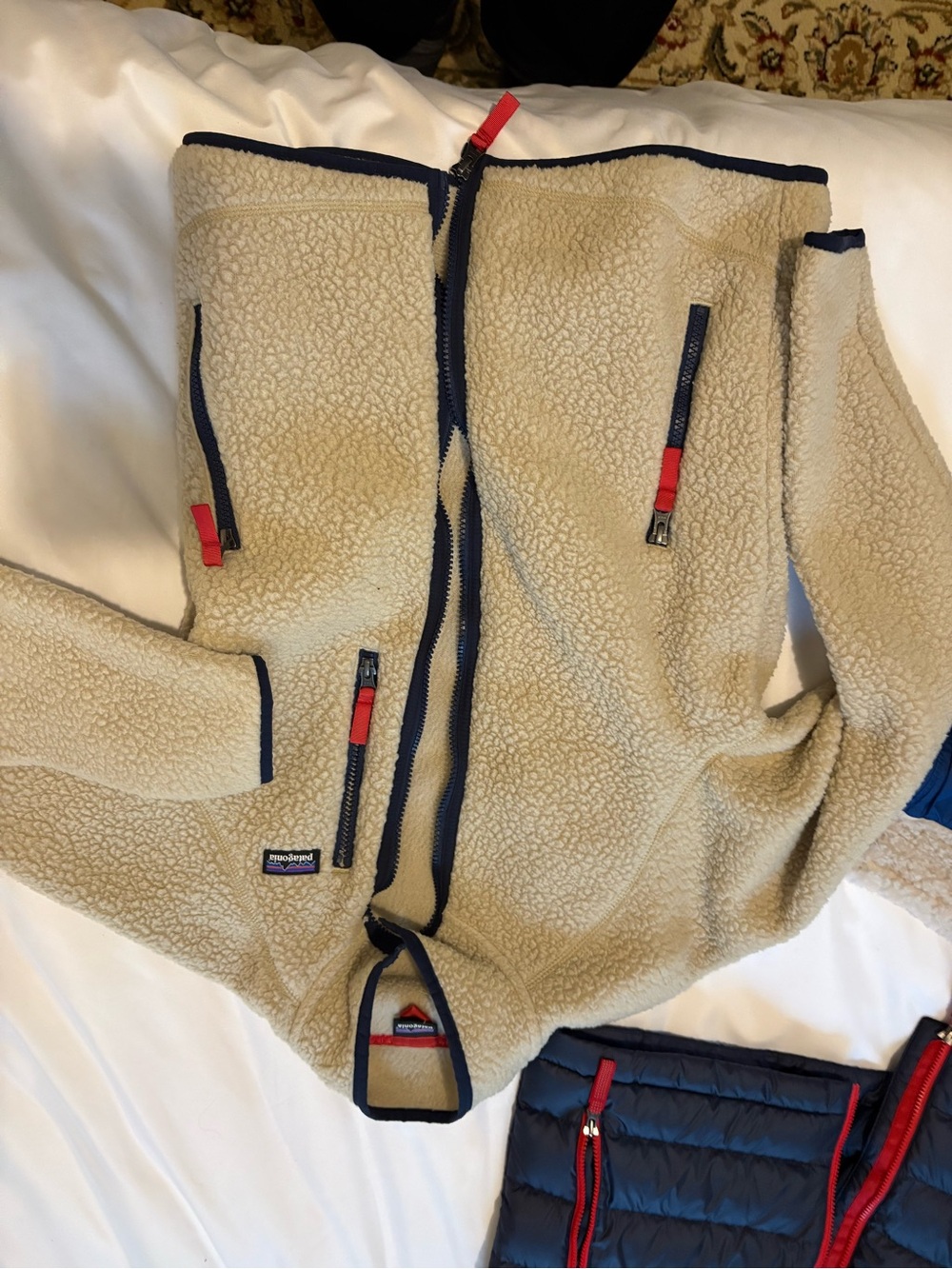 Patagonia Beige Sherpa Fleece Jacket with Navy Trim and Red Accents